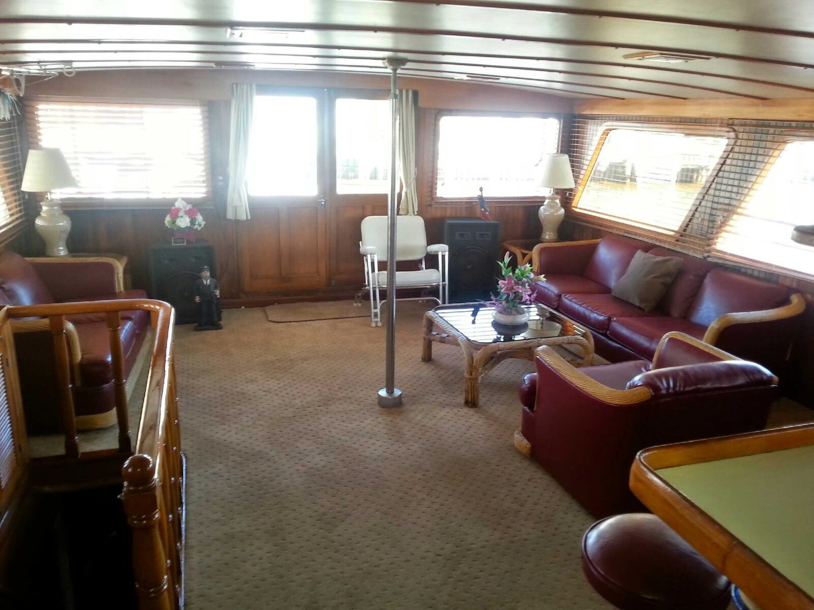 Interior salon with leather seating and wood paneling